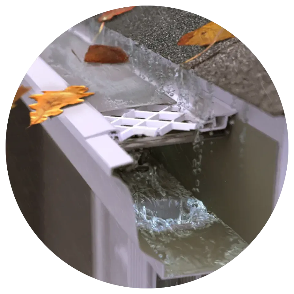 LeafFilter product with leaves sitting outside of the gutter